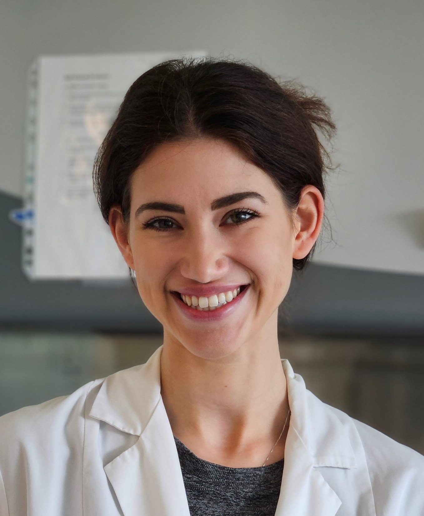 Person in a lab coat in a laboratory