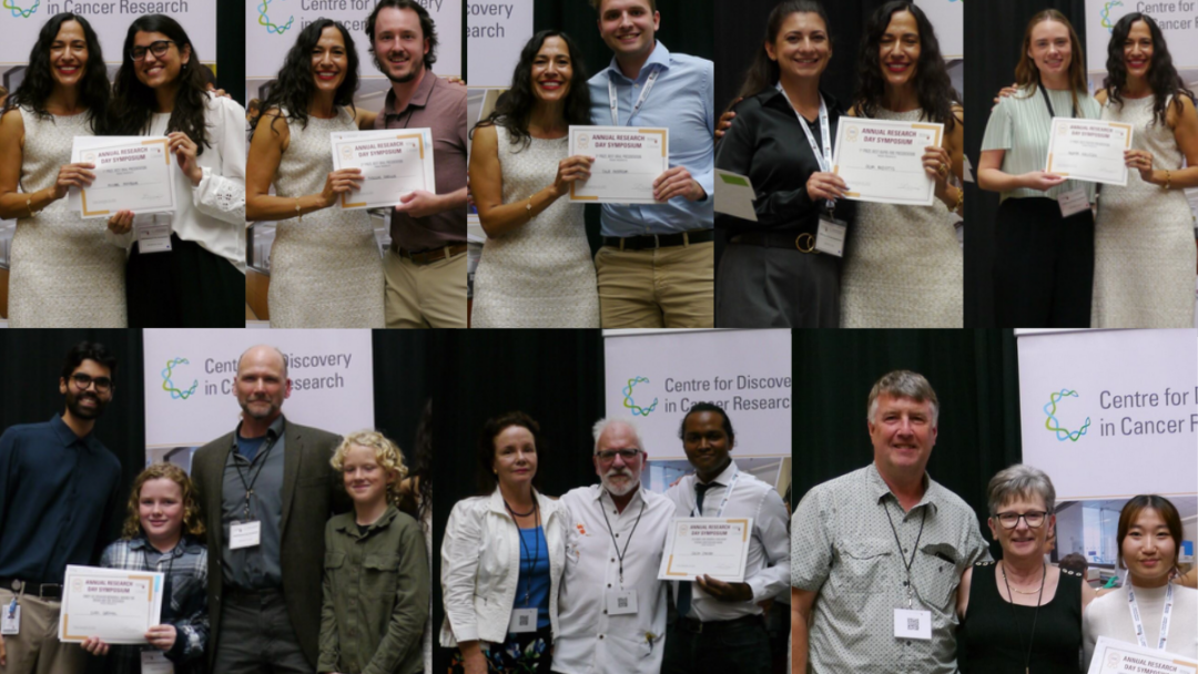 People smiling holding up award certificates